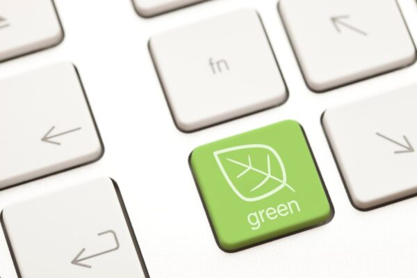 A imagem mostra um teclado com a tecla "green", em tradução livre, "verde".